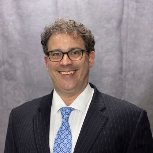 CJC Transport - Adam DiAntonio, man in a suit and tie