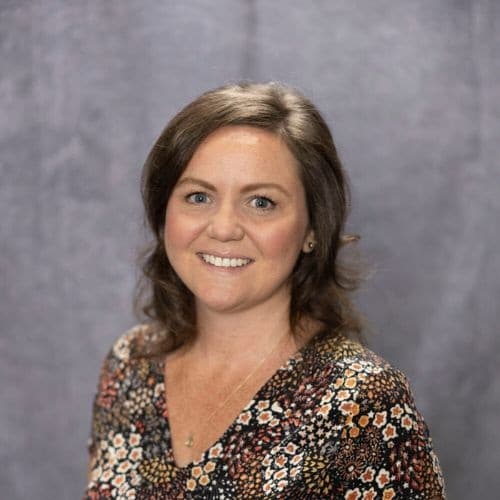 CJC Transport - Katie Murphy in a floral blouse